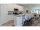 Modern kitchen with granite countertops, stainless steel appliances, and an island at 1741 Old Fields Blvd, Haw River, NC 27258