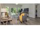 Comfortable living room with sliding glass doors leading to patio at 1741 Old Fields Blvd, Haw River, NC 27258