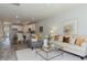 Open concept living room and kitchen with a dining area visible, offering a spacious feel at 1741 Old Fields Blvd, Haw River, NC 27258