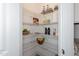Well-organized pantry with wire shelving, perfect for storage at 1741 Old Fields Blvd, Haw River, NC 27258