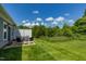 Private patio with seating area and green space at 1741 Old Fields Blvd, Haw River, NC 27258