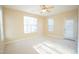 Bright bedroom featuring natural light and neutral carpeting at 1912 Parkside Village Dr, Clayton, NC 27520