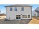 A wide view of the backyard and rear exterior showing the vinyl siding at 216 Horseshoe Pl # 25, Angier, NC 27501