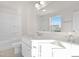 Bright bathroom with double sink vanity, and a shower-tub combo at 216 Horseshoe Pl # 25, Angier, NC 27501