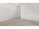 A clean and simple bedroom with two doors and neutral carpeting at 216 Horseshoe Pl # 25, Angier, NC 27501