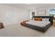 Spacious bedroom with a large bed, comfortable linens, and two windows for lots of natural light at 216 Horseshoe Pl # 25, Angier, NC 27501