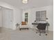Bright home office featuring a modern desk, stylish chair, and natural light from the window at 216 Horseshoe Pl # 25, Angier, NC 27501