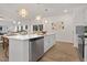 Spacious kitchen featuring a large island, pendant lights, and an open-concept design at 216 Horseshoe Pl # 25, Angier, NC 27501