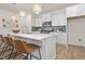 Bright kitchen with a large island, stainless steel appliances, and stylish backsplash at 216 Horseshoe Pl # 25, Angier, NC 27501