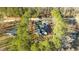 Aerial view of a house with a pond and large backyard at 225 Rudd Rd, Youngsville, NC 27596