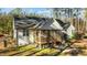House with a screened porch and a large backyard at 225 Rudd Rd, Youngsville, NC 27596