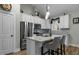 Modern kitchen with stainless steel appliances and granite countertops at 225 Rudd Rd, Youngsville, NC 27596