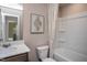 Clean bathroom with bathtub, shower, and vanity at 242 Broomside Ave, Raleigh, NC 27603