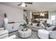 Open concept living room with ample natural light and modern furniture at 242 Broomside Ave, Raleigh, NC 27603