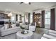 Open living room with hardwood floors and access to kitchen at 242 Broomside Ave, Raleigh, NC 27603