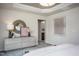 Spacious main bedroom with dresser, large mirror, and en-suite bathroom access at 242 Broomside Ave, Raleigh, NC 27603