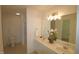 Double vanity bathroom with large mirror and separate shower at 2530 Friedland Pl # 104, Raleigh, NC 27617