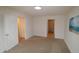 Bright bedroom with carpet flooring and access to bathroom at 2530 Friedland Pl # 104, Raleigh, NC 27617