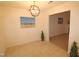Bright dining area with tile flooring and chandelier at 2530 Friedland Pl # 104, Raleigh, NC 27617