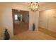 Bright and spacious entryway with tile flooring and views to living areas at 2530 Friedland Pl # 104, Raleigh, NC 27617