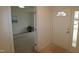 Inviting entryway, with view into additional rooms and exterior at 2530 Friedland Pl # 104, Raleigh, NC 27617