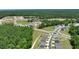 Aerial view of a new residential community with houses and green spaces at 313 Umstead St, Sanford, NC 27330