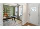 Bright home office features a large desk, built-in shelving, and an accent wall at 313 Umstead St, Sanford, NC 27330