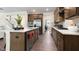 Modern kitchen with stainless steel appliances and an island with seating at 313 Umstead St, Sanford, NC 27330