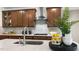 Luxury kitchen boasts quartz countertops and a stylish backsplash at 313 Umstead St, Sanford, NC 27330