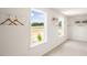 Spacious walk-in closet with built-in shelves and window at 313 Umstead St, Sanford, NC 27330