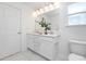 Bright bathroom with double vanity and marble flooring at 35 Mable Court # 3, Lillington, NC 27546