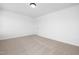 Simple bedroom with neutral carpet and a door at 35 Mable Court # 3, Lillington, NC 27546