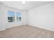 Bedroom with window view and neutral carpet at 35 Mable Court # 3, Lillington, NC 27546
