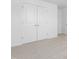 White double door closet in a carpeted room at 35 Mable Court # 3, Lillington, NC 27546