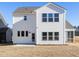 Rear view of two story home with patio at 35 Mable Court # 3, Lillington, NC 27546