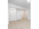 Clean hallway with carpet flooring and multiple doors at 35 Mable Court # 3, Lillington, NC 27546