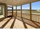 Spacious screened porch overlooking a large backyard at 4863 Grosbeak Ct, Mebane, NC 27302