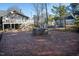 Brick patio with fire pit, ideal for outdoor entertaining at 507 Hawkins Ave, Sanford, NC 27330