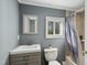 Updated bathroom with a single vanity and shower/tub combo at 507 Hawkins Ave, Sanford, NC 27330