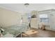 Small bedroom with a single bed and built-in shelves at 507 Hawkins Ave, Sanford, NC 27330