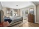 Bright bedroom with double doors leading to a deck at 507 Hawkins Ave, Sanford, NC 27330