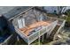 Elevated deck with stairs and built-in grill at 507 Hawkins Ave, Sanford, NC 27330