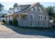 Gray house with a front porch and landscaping at 507 Hawkins Ave, Sanford, NC 27330