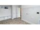 Laundry room with built-in shelving and extra storage at 55 Watermelon Dr, Franklinton, NC 27525