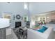 Open living room with a fireplace, and views into the dining area at 55 Watermelon Dr, Franklinton, NC 27525