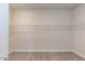 Large walk-in closet with wire shelving for hanging clothes at 55 Watermelon Dr, Franklinton, NC 27525
