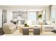 Spacious living room with sectional sofa, coffee table, and two armchairs at 1013 Aspen View Dr, Raleigh, NC 27610