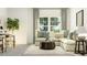 Relaxing living room with sectional sofa, coffee table, and large windows at 1013 Aspen View Dr, Raleigh, NC 27610