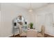 Charming dining area with glass table, chairs, and access to the kitchen at 10947 Pendragon Pl, Raleigh, NC 27614