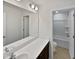 Clean bathroom, double vanity, and a shower/tub combo at 110 Shining Amber Way, Franklinton, NC 27525